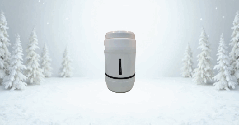 Insulated tumbler in snowy forest setting